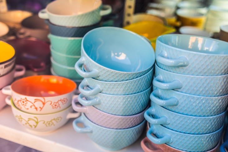 Colorful ceramic soup bowls on display